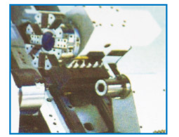 Hydraulic cam turret